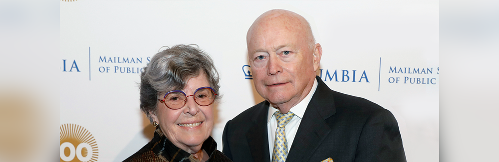Valerie Rowe on the left and Jack Rowe on the right posing at a benefit. 