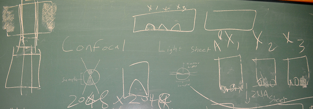 6-blackboard-notes-comparing-imaging-systems-in-a-mbl-whitman-center-lab