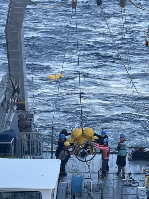 Sediment trap being deployed on the OFP mooring by Rut Pedrosa Pamies and the crew of the R/V Atlantic Explorer. Credit: Ashley Reep