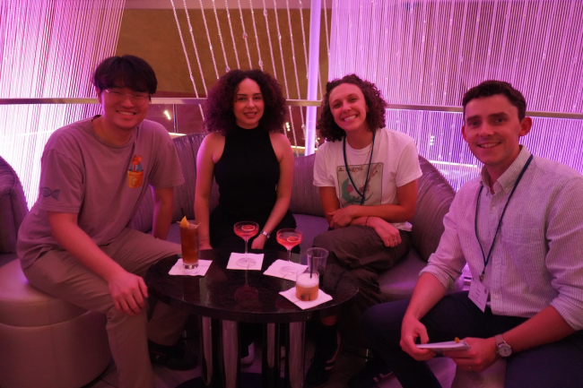 Alumni gathered around a table