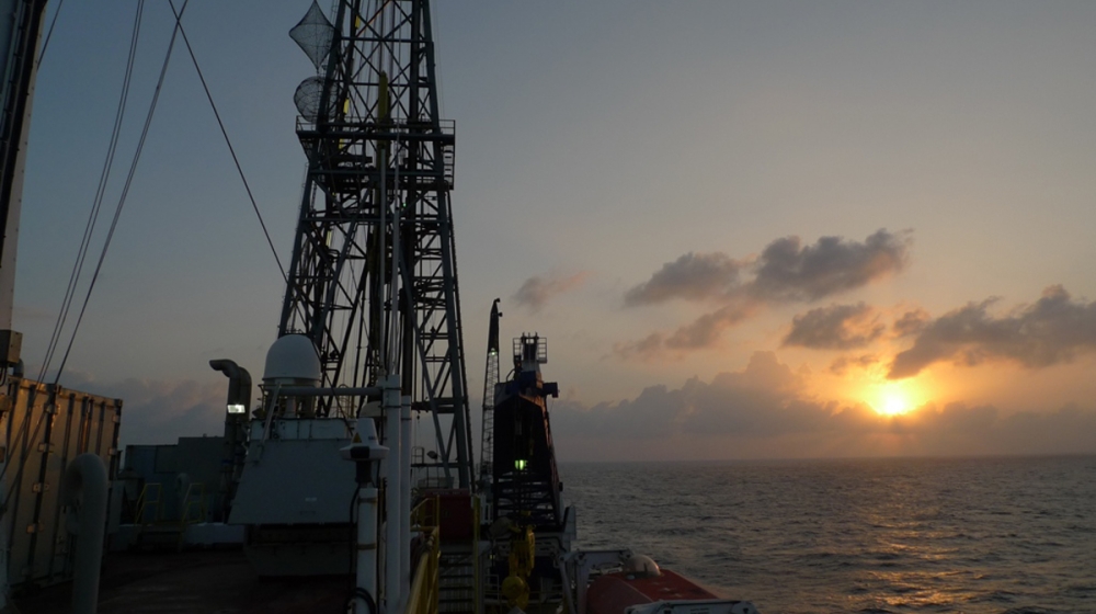 7.	JOIDES Resolution, a scientific drilling ship, in the South China Sea, 2014. Drilling the seafloor is much more difficult than drilling on land and it requires enormous ships specifically dedicated for this task. The drill is often several kilometers long before it even reaches the seafloor. Credit: Rick Colwell