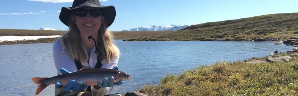 Heidi Golden holds Arctic Grayling