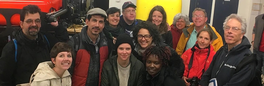 Thirteen newly christened sea dogs in the Nereid remotely operated vehicle shed at WHOI.