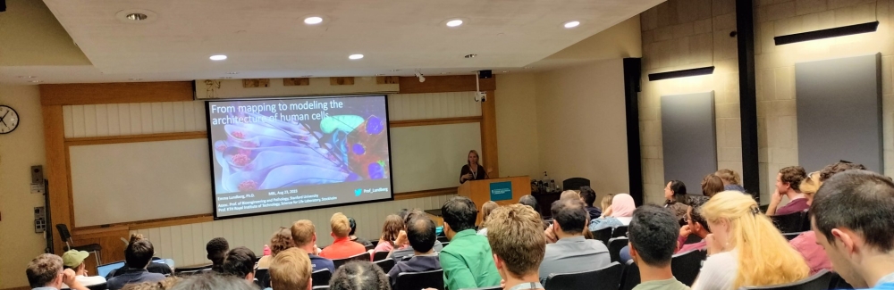 Students from the Optical Microscopy (OMIBS) and Deep Learning 2023 Advanced Research Training Courses in a lecture in Speck Auditorium.