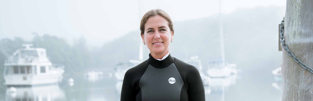 Loretta Roberson at MBL dock with scuba gear.