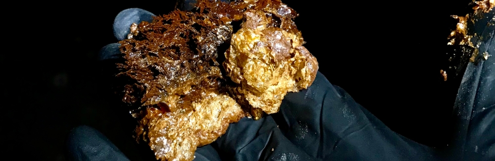 2. An iron oxide microbial mat that develops in the outflow channels from the boreholes drilled at the Soudan Underground Iron Mine in northern Minnesota. Credit: Cody Sheik