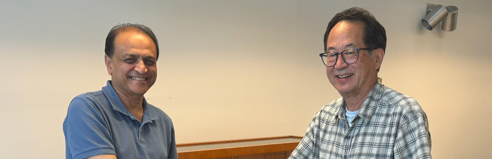Nipam Patel and Mark Terasaki shake hands