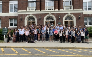 Attendees of the Neurobiology 50th Anniversary Symposium pose on the steps of Lillie Laboratory.