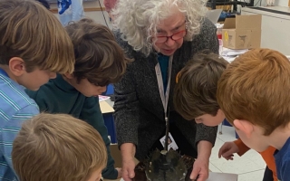 Judy Venuti at a woods hole after school program