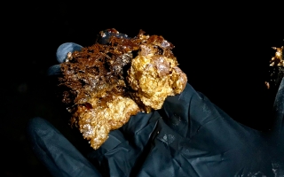 2. An iron oxide microbial mat that develops in the outflow channels from the boreholes drilled at the Soudan Underground Iron Mine in northern Minnesota. Credit: Cody Sheik