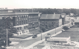 The Lillie Building and its Crane wing (on the left), the stone building on the right next to the brick Crane wing is the Candle House.