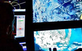 The R/V Falkor’s control room during a dive of the remotely operated vehicle ROPUS to Axial Seamount to collect samples