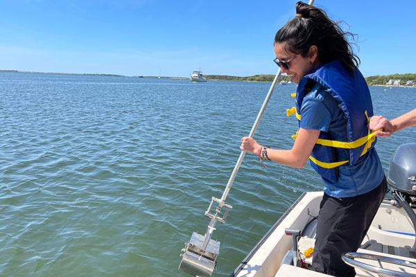 Tatiana Pardo Ibarra sampling in Waquoit Bay Credit Andres Pruna