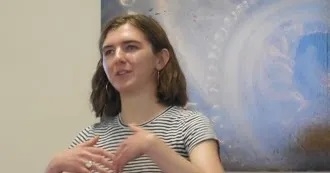 Caption: Beatrice Steinert speaking at the MBLWHOI Library about drawing cells of marine slipper shells (Photo: Matthew Person).