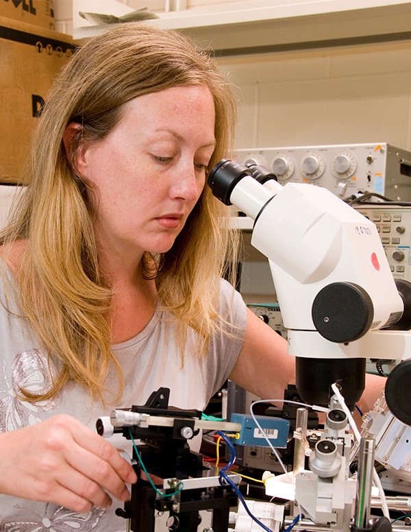 woman at microscope