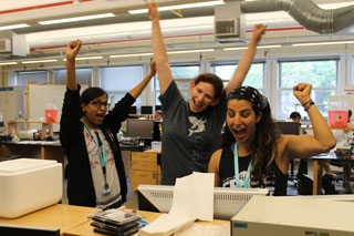 From left: Manisha Sinha from Indian Institute of Science, Hilary Katz from the University of Chicago, and Dalia Salloum from Rutgers University celebrate a successful experiment in the MBL Neural Systems and Behavior course.