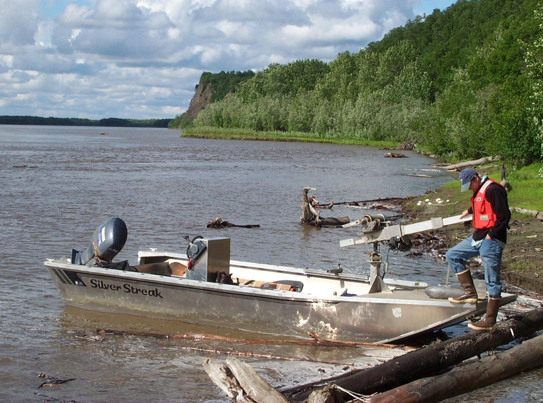 Yukon River near the village of Pilot Station, Alaska. James McClelland is getting ready to board a US Geological Survey boat.