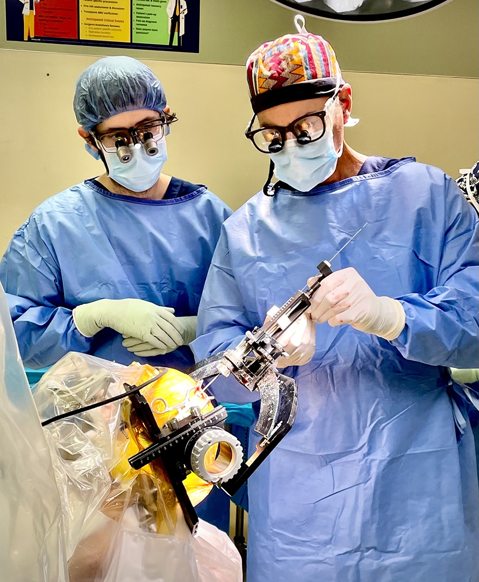 Craig van Horne, on right, performing deep brain stimulation on a patient with Parkinson's Disease in 2023.
