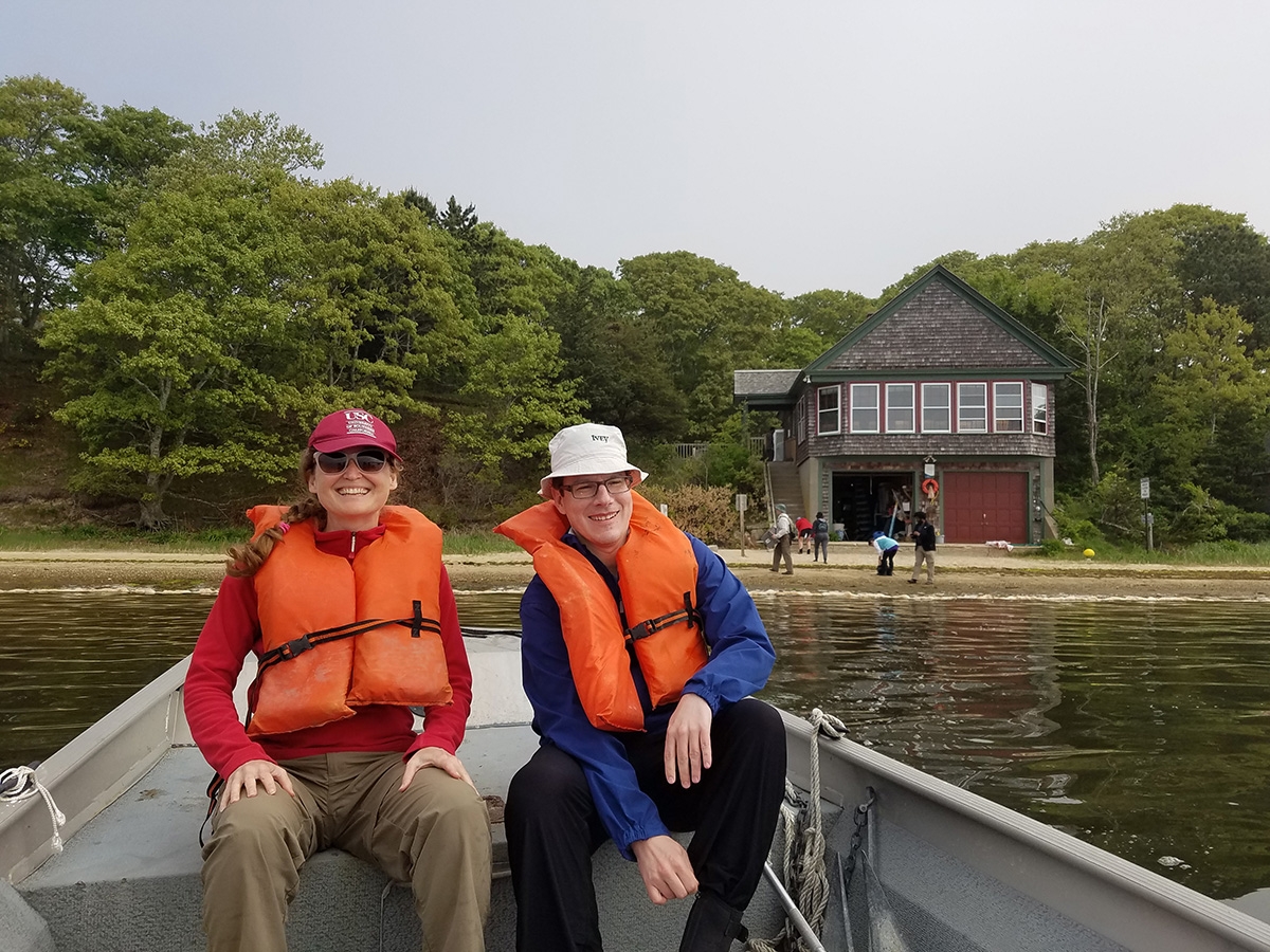2018 Logan Science Journalism Environmental Fellows Katherine Bourzac (left) and Mićo Tatalović (right) prepare to collect water samples from an estuary ecosystem near Woods Hole.