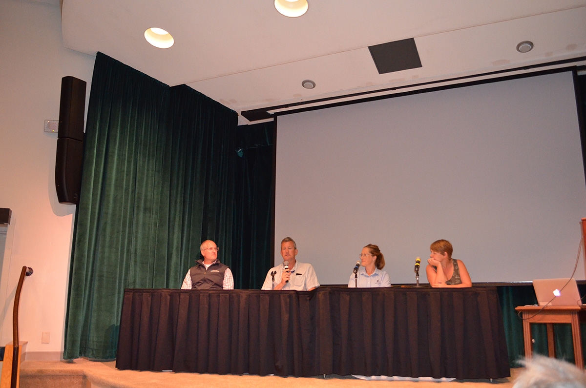 Panelists answer questions about how aquariums can aid in conservation. From left: John Mandelman, David Remsen, Kristy Owen, and Samantha Muka. 