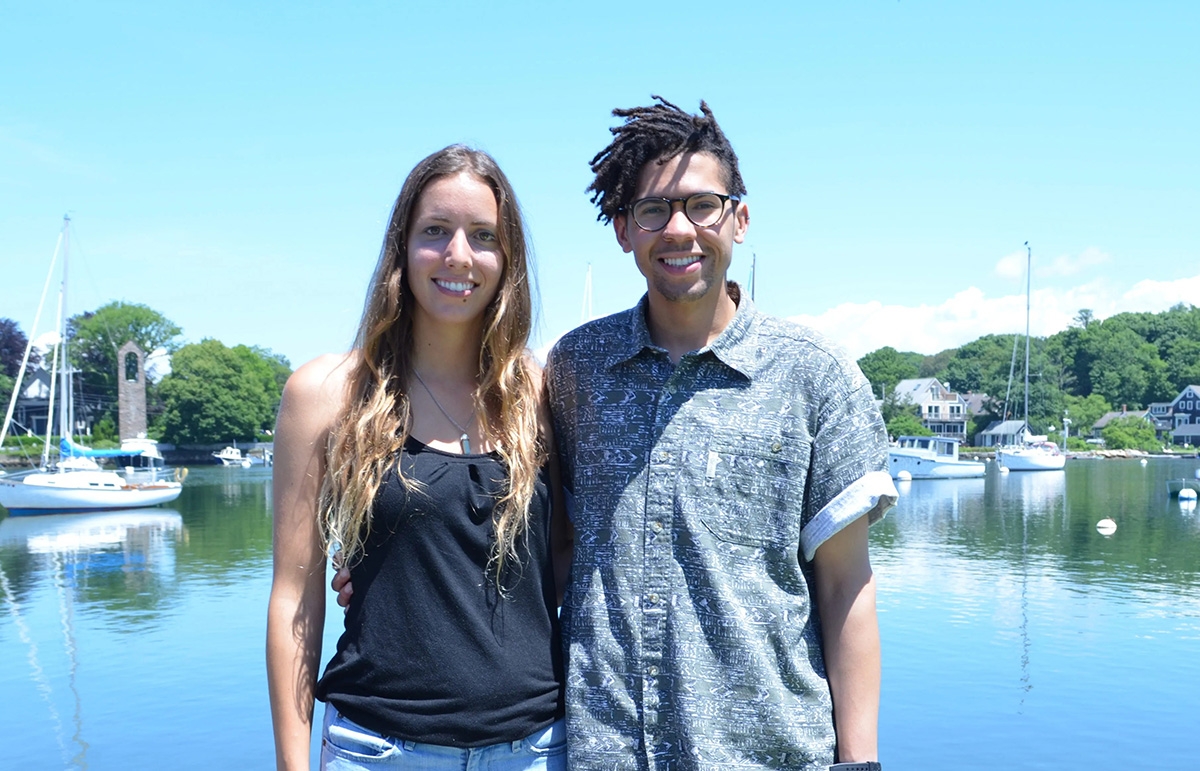 Recipients of NSF Graduate Research Fellowships Jacey Van Wert, left, and Loranzie (LJ) Rogers, right, near Eel Pond, outside the Marine Biological Laboratory's Marine Resources Center.