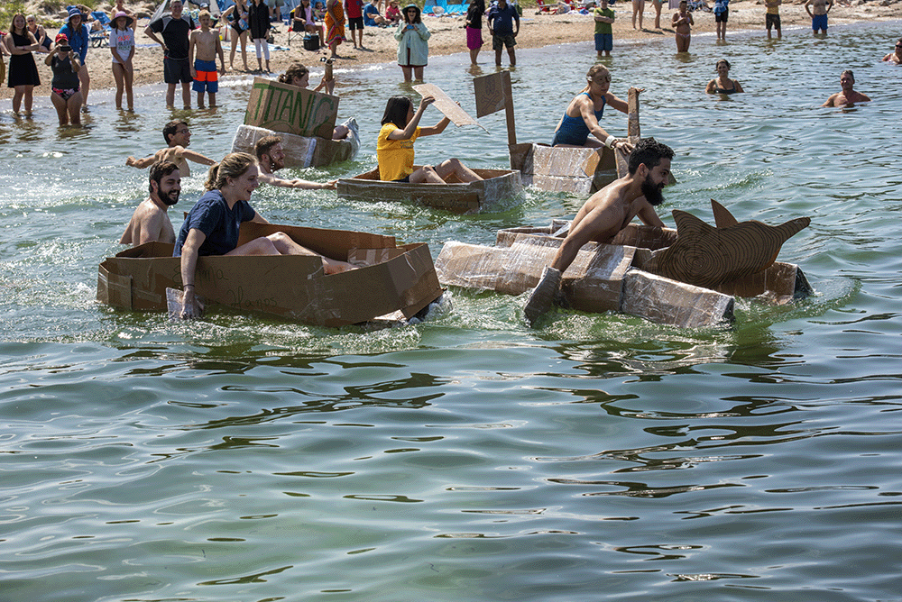 Students in Brains, Minds, and Machines race their hand-built boats at Stoney Beach. A boat-building competition is an annual team-building exercise and highlight of the course.