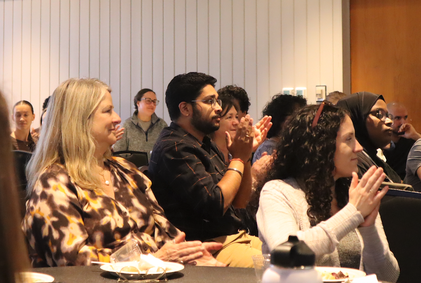 In foreground, Barbara Burbank, Akshay Kane, and Briana Bertochi.