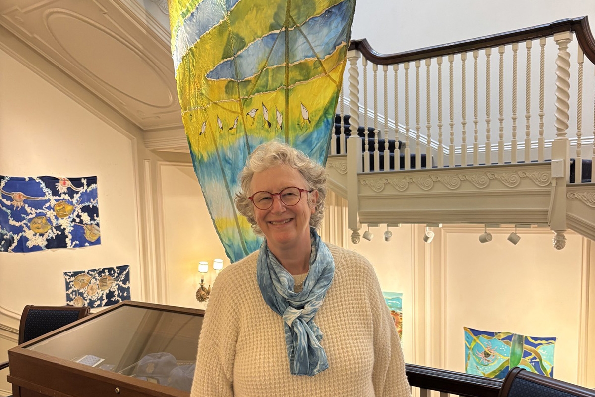 Susan Quateman at her exhibit at St. Botolph Club in Boston.