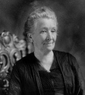 Cornelia Clapp posed in chair. Credit: MBL Archives