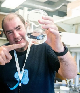 José Luis Gómez-Skarmeta of Centro Andaluz de Biología del Desarrollo with a little skate hatchling in his MBL Whitman Center lab in 2018. Credit: Megan Costello