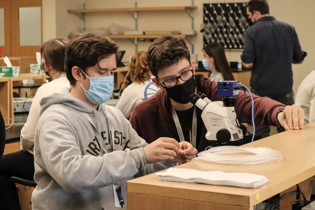 two students from barnstable high school in a lab at the MBL