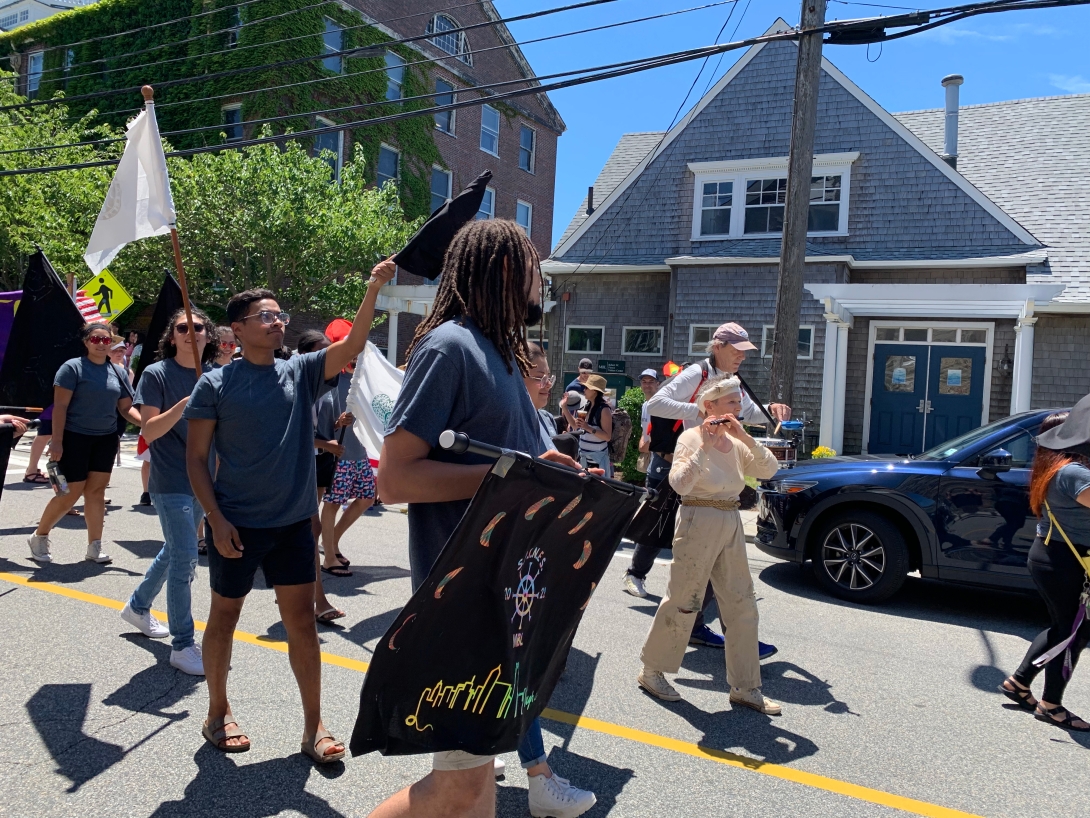 Participants march in the 2022 Woods Hole Fourth of July Parade