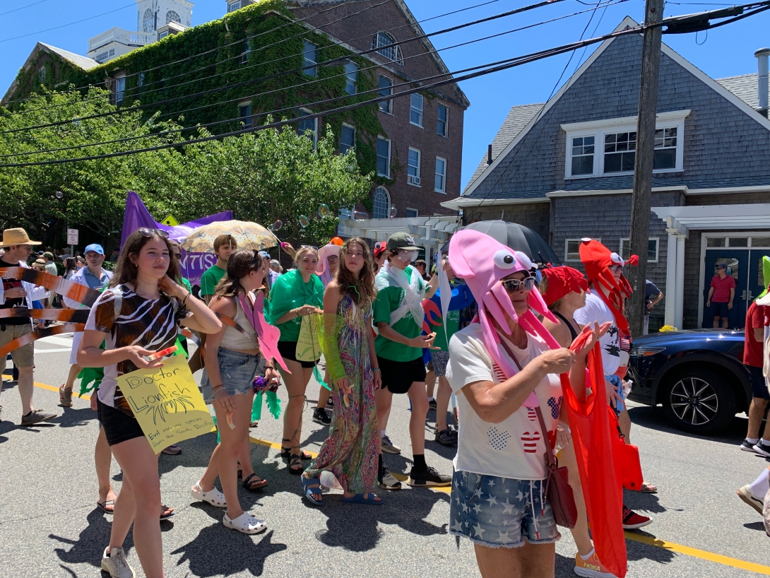 Participants march in the 2022 Woods Hole Fourth of July Parade