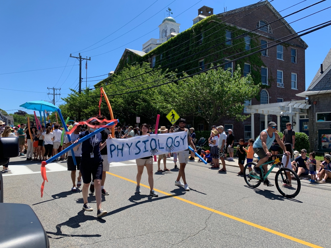 Participants march in the 2022 Woods Hole Fourth of July Parade