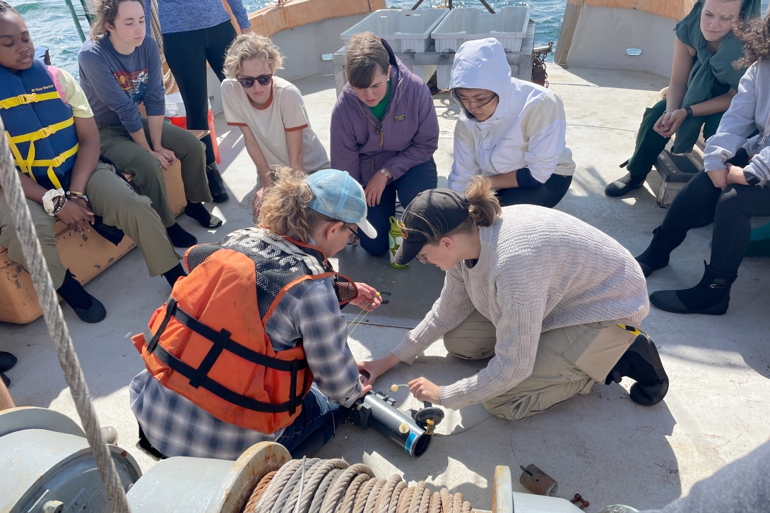 Students sample on a boat